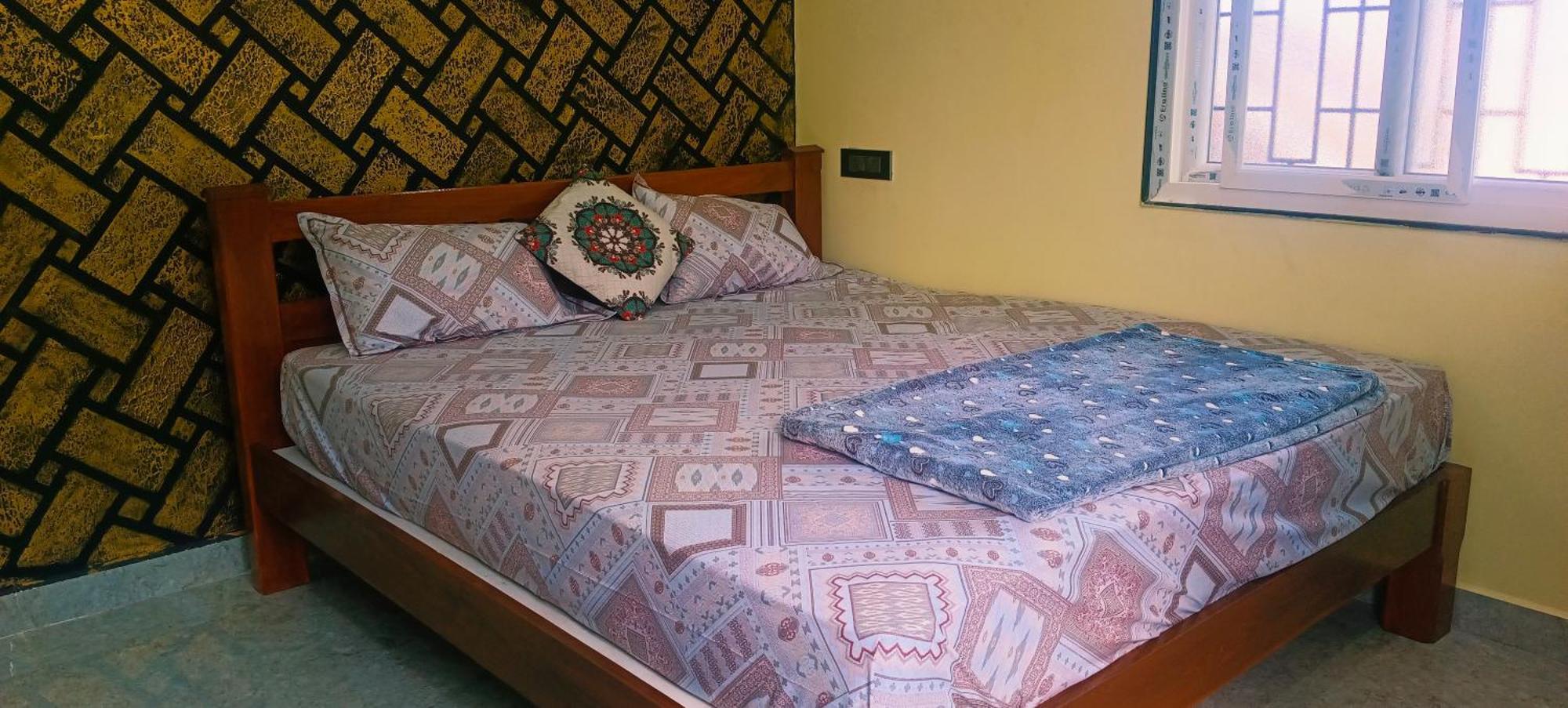 Sai Ram Home Stay ฮัมปี ภายนอก รูปภาพ